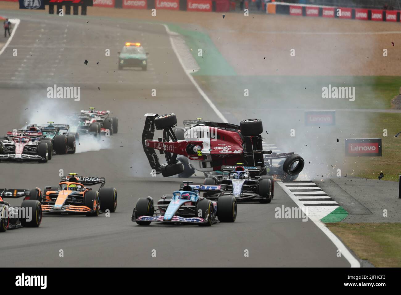 Silverstone, UK. 3rd July 2022,  Silverstone Circuit, Silverstone, Northamptonshire, England: British F1 Grand Prix, Race day: Race start, Alfa Romeo F1 Team Orlen, Guanyu Zhou crashes after locking wheels with George Russell Credit: Action Plus Sports Images/Alamy Live News Stock Photo