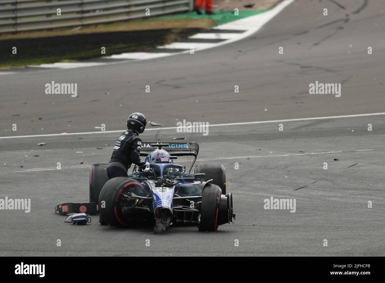 Silverstone, UK. 3rd July 2022,  Silverstone Circuit, Silverstone, Northamptonshire, England: British F1 Grand Prix, Race day: Williams Racing, Alex Albon is checked out by doctors Credit: Action Plus Sports Images/Alamy Live News Stock Photo