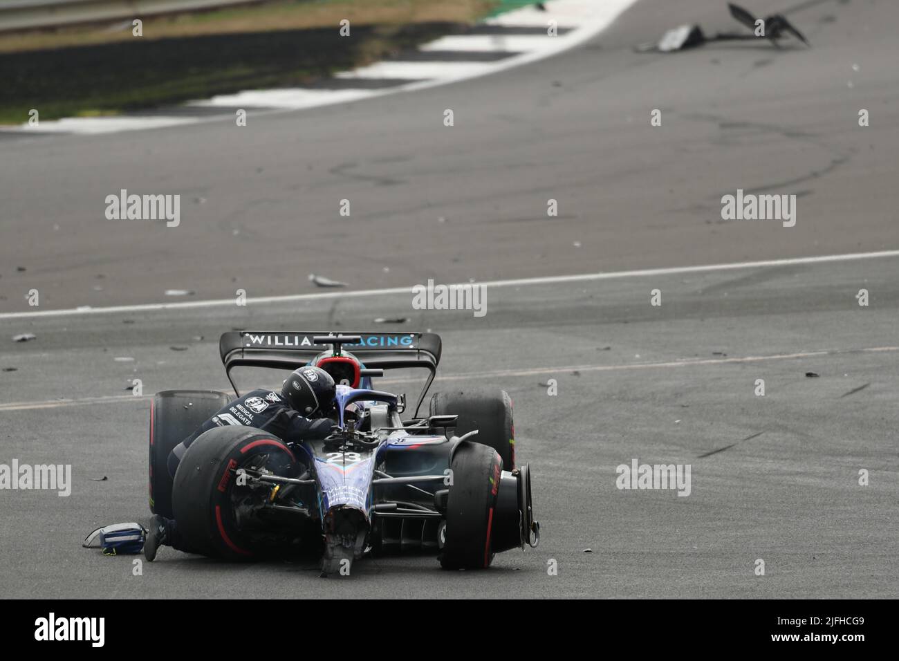 Silverstone, UK. 3rd July 2022, Silverstone Circuit, Silverstone, Northamptonshire, England: British F1 Grand Prix, Race day: Williams Racing, Alex Albon is checked out by doctors Credit: Action Plus Sports Images/Alamy Live News Stock Photo