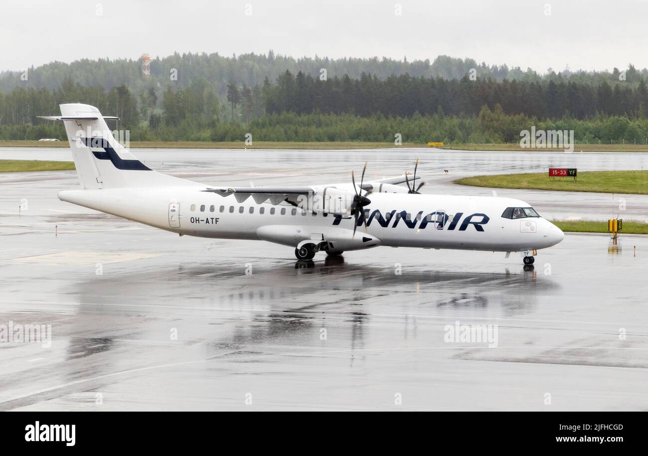 Finnair Plane; a Finnair propeller plane on the ground at Helsinki airport, Helsinki, Finland Europe Stock Photo