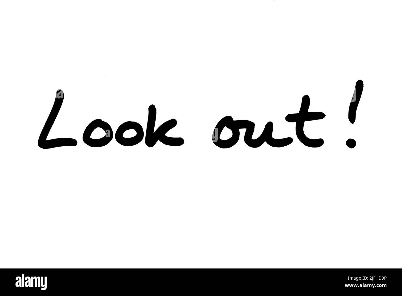Look out! handwritten on a white background. Stock Photo