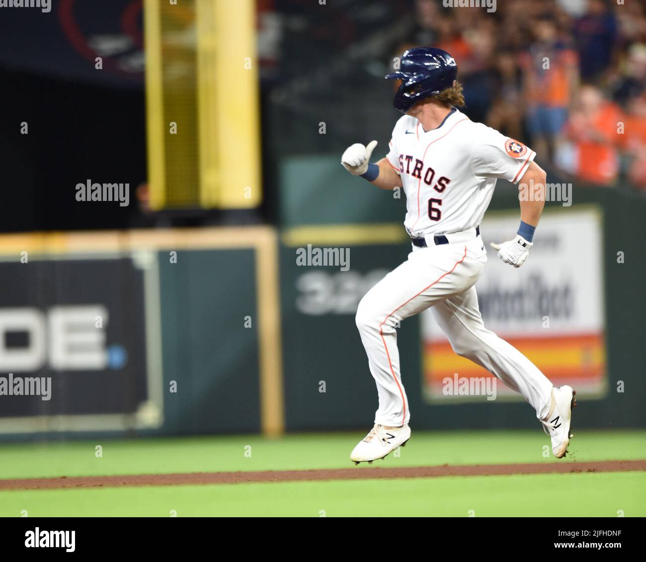 Houston Astros center fielder Jake Meyers (6) hits a double to deep center field during the third inning of the MLB game between the New York Yankees Stock Photo