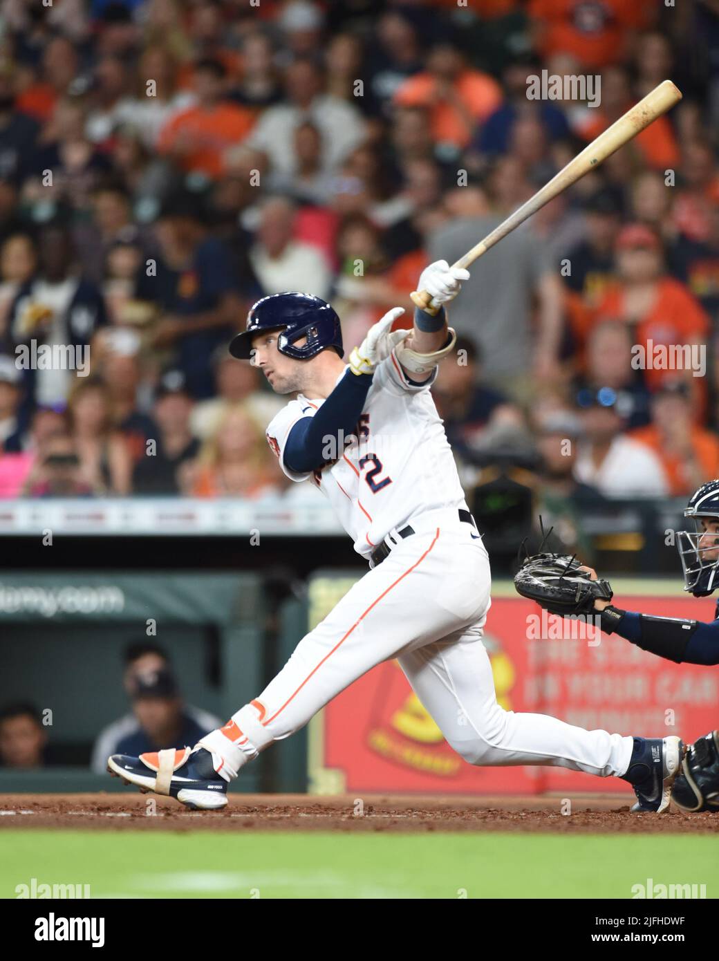 Houston, United States. 30th June, 2022. Houston Astros third baseman Alex  Bregman (2) hits a 2 RBI double to deep let field during the third inning  of the MLB game between the