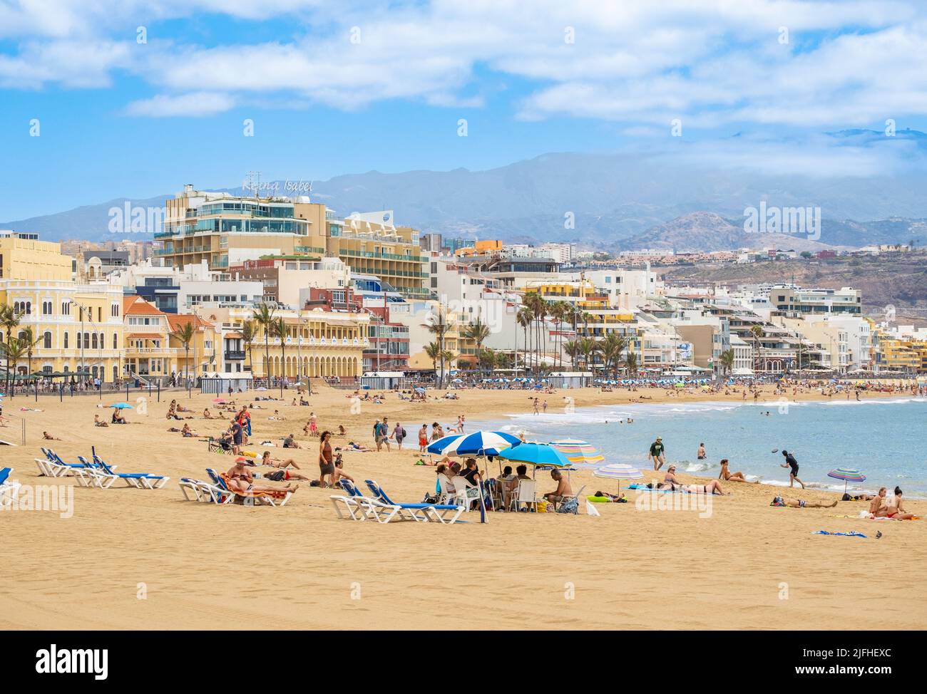 Las Palmas, Gran Canaria, Canary Islands, Spain. 3rd July, 2022. Tourists, many from the UK, on the city beach in Las Palmas on Gran Canaria; a popular holiday destination for many UK holidaymakers. Flight cancellations and staff shortages at some UK airports are expected to cause disruption throughout the summer. Credit: Alan Dawson/ Alamy Live News. Stock Photo
