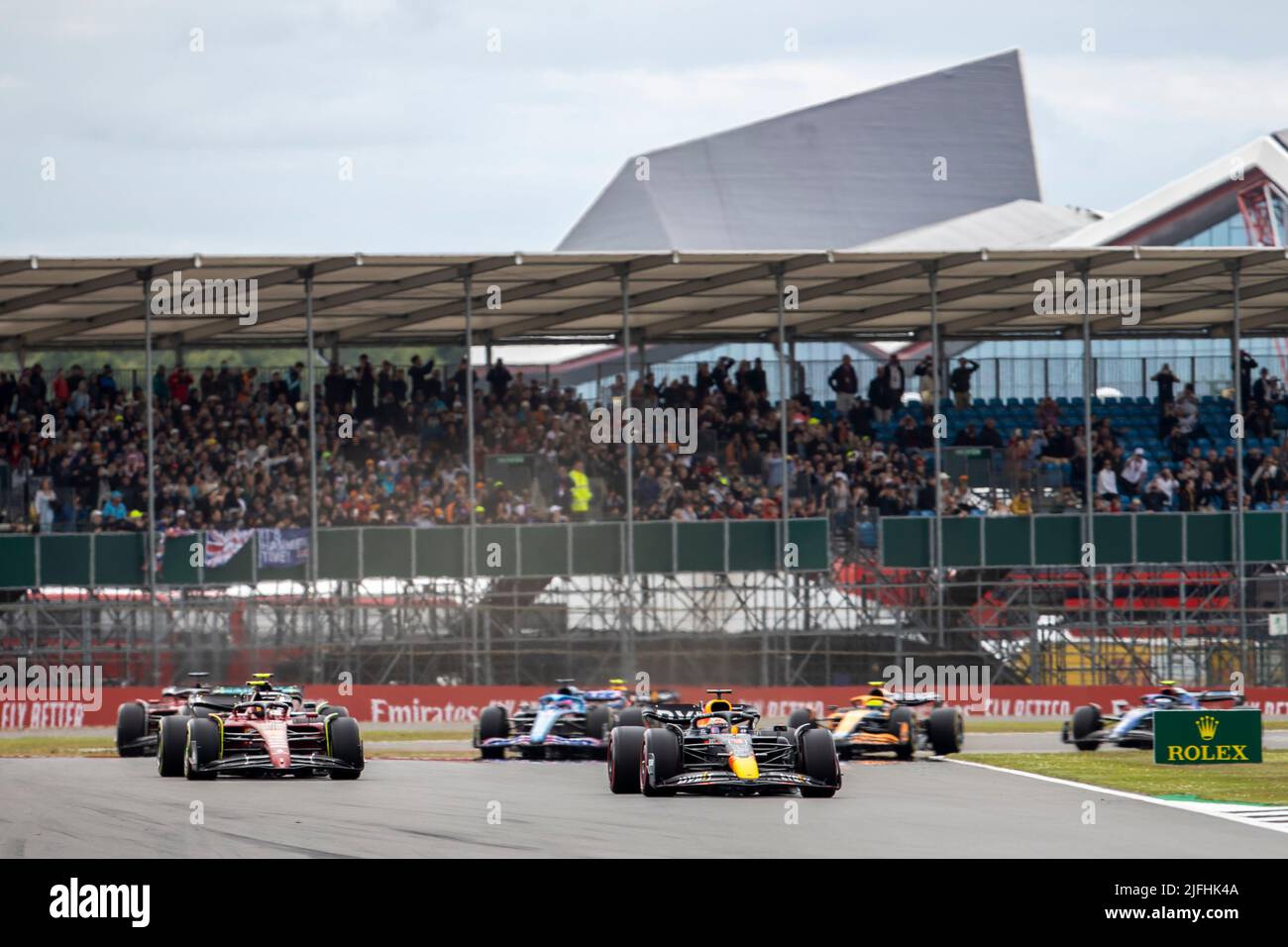 Silverstone, UK. 3rd July 2022,  Silverstone Circuit, Silverstone, Northamptonshire, England: British F1 Grand Prix, Race day: Oracle Red Bull Racing driver Max Verstappen in his Red Bull Racing-RBPT RB18 leads the opening lap of the first start Credit: Action Plus Sports Images/Alamy Live News Stock Photo