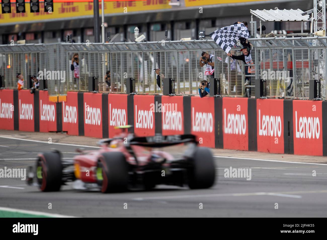 Silverstone, UK. 3rd July 2022,  Silverstone Circuit, Silverstone, Northamptonshire, England: British F1 Grand Prix, Race day: Scuderia Ferrari driver Carlos Sainz Jr takes the chequered flag Credit: Action Plus Sports Images/Alamy Live News Stock Photo