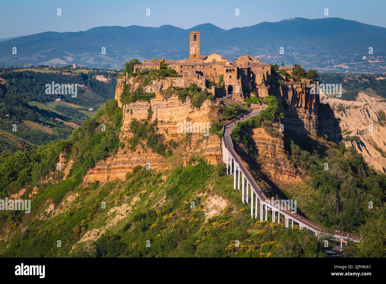 Stunning panoramic view with famous Civita di Bagnoregio medieval village on the cliffs at sunset, Lazio, Italy, Europe Stock Photo