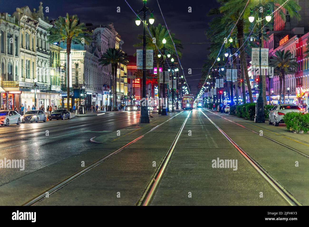 Streetcars through Canal Street at night Stock Photo Alamy