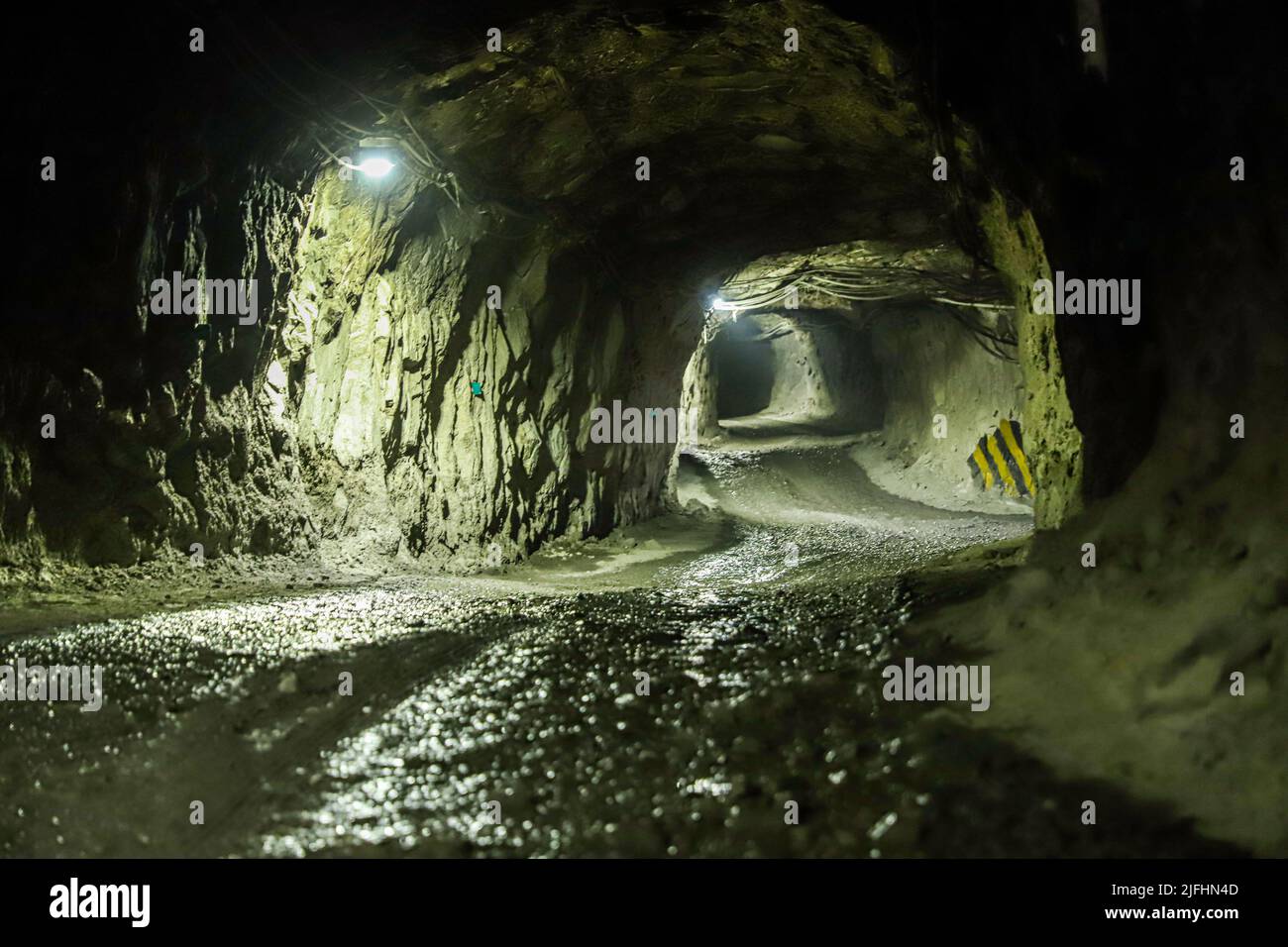 Underground mine, mining, extraction of mineral and rock subsoil for gold, silver, copper and zinc in tunnels. Mina Subterana, mineria, extracion del Stock Photo