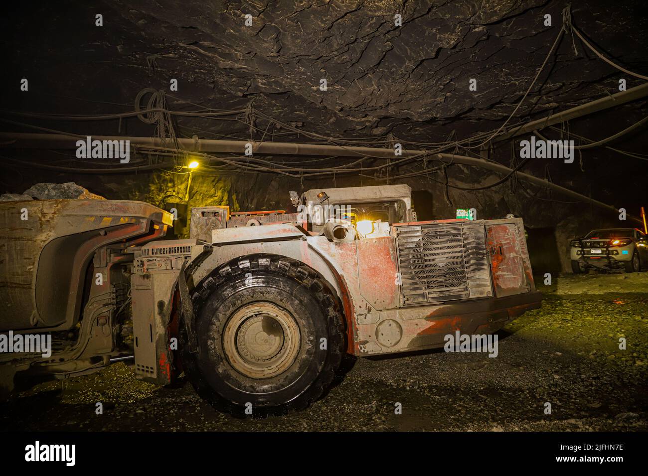 Underground mine, mining, extraction of mineral and rock subsoil for gold, silver, copper and zinc in tunnels. Mina Subterana, mineria, extracion del Stock Photo