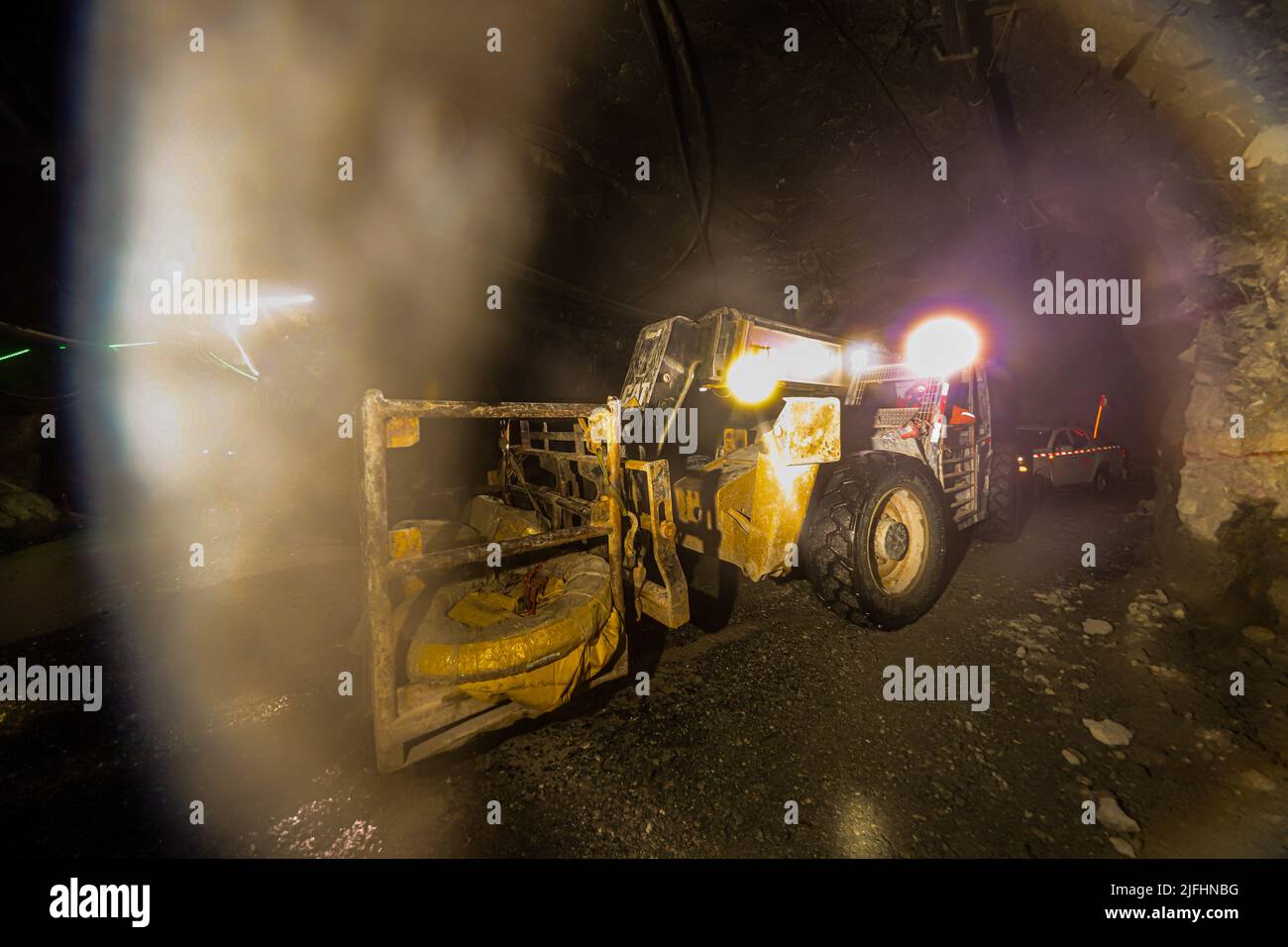 Underground mine, mining, extraction of mineral and rock subsoil for gold, silver, copper and zinc in tunnels. Mina Subterana, mineria, extracion del Stock Photo