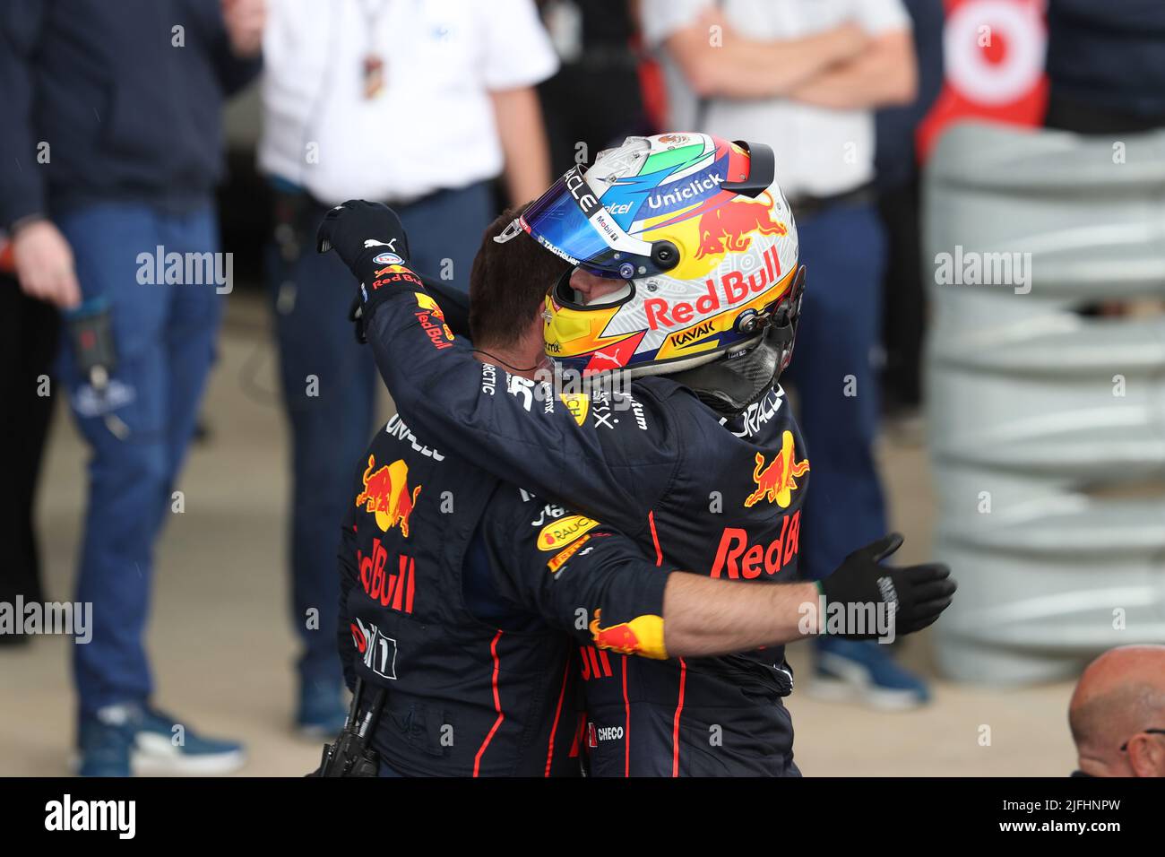 Silverstone, UK. 3rd July 2022,  Silverstone Circuit, Silverstone, Northamptonshire, England: British F1 Grand Prix, Race day: Oracle Red Bull Racing, Sergio Perez comes second and is hugged by a team member Credit: Action Plus Sports Images/Alamy Live News Stock Photo