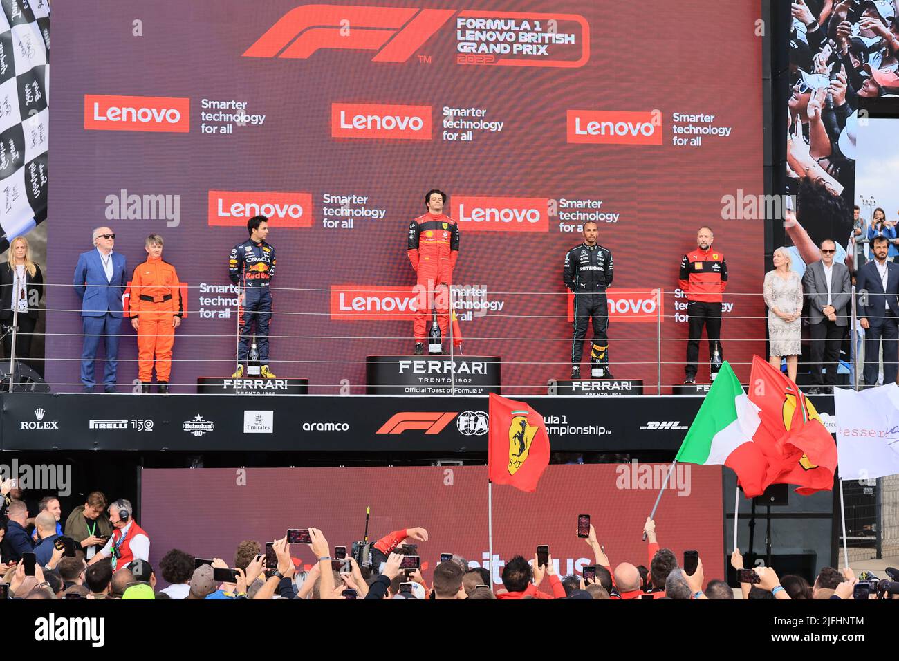 Silverstone, UK. 3rd July 2022, Silverstone Circuit, Silverstone, Northamptonshire, England: British F1 Grand Prix, Race day: Scuderia Ferrari, Carlos Sainz wins the British GP followed by Oracle Red Bull Racing, Sergio Perez and Mercedes AMG Petronas F1 Team, Lewis Hamilton Credit: Action Plus Sports Images/Alamy Live News Stock Photo