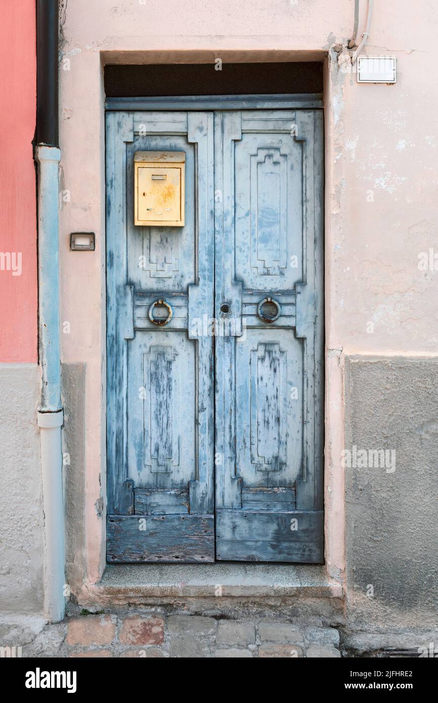 Ancient house, front view of old blue door Stock Photo - Alamy