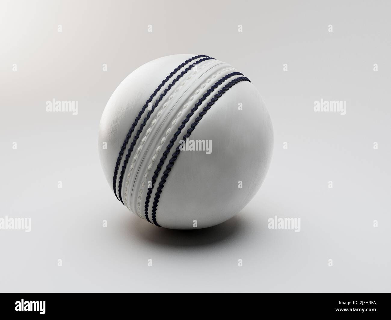 A regular white cricket ball with navy stitching on an isolated