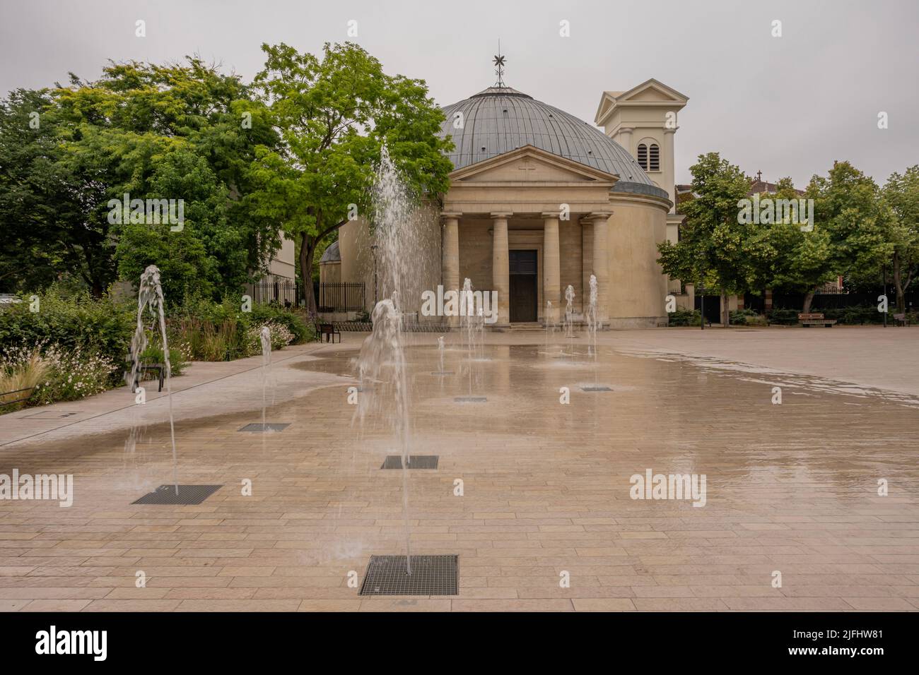 Reflections on the wet floor of the Church of SaintPierreSaintPaul in Courbevoie Stock Photo Reflections on the wet floor of the Church of SaintPierreSaintPaul in Courbevoie Stock Photo