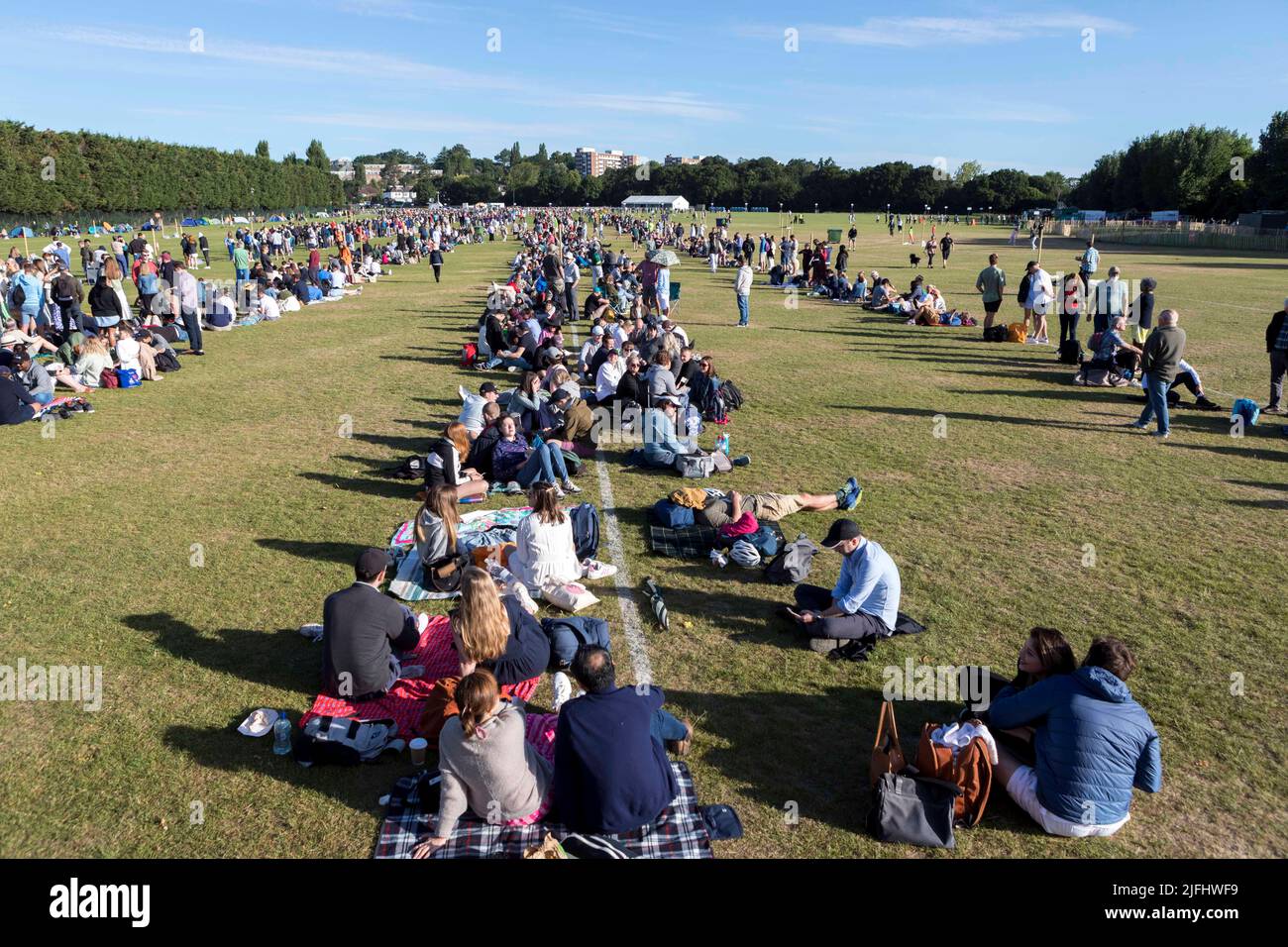 Tennis fans form long queues at Wimbledon Park this morning for tickets ahead of The Championship.   Image shot on 27th June 2022.  © Belinda Jiao   j Stock Photo