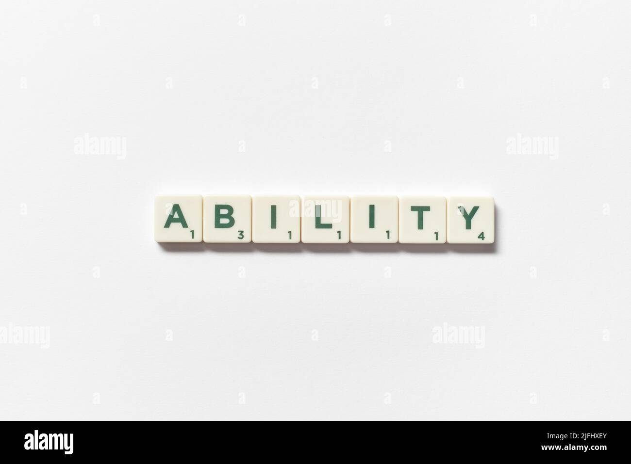 Ability formed of scrabble blocks on white background Stock Photo Alamy