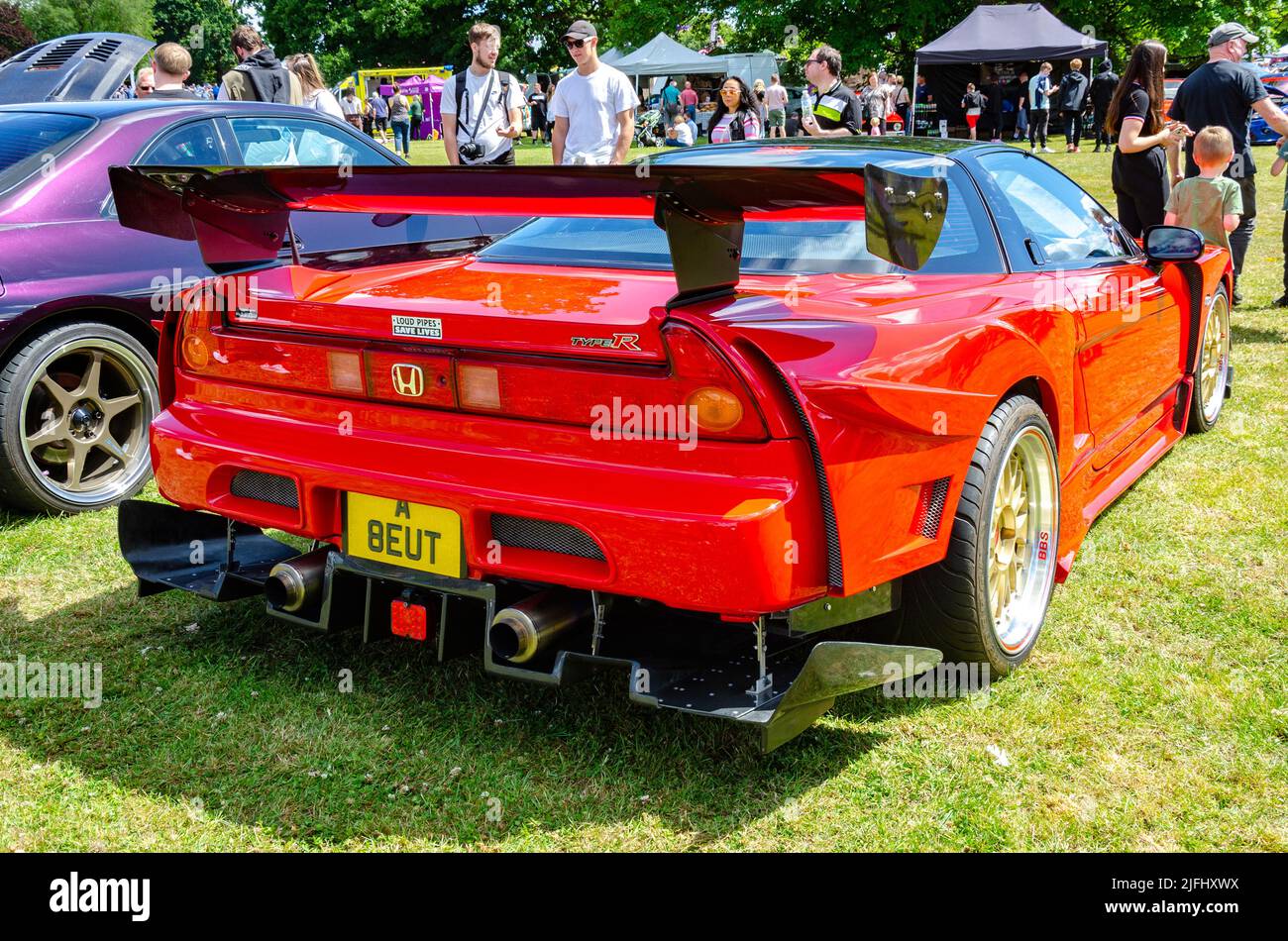 Rear view of a red 1992 Honda NSX sports car at The Berkshire Motor Show in Reading, UK Stock Photo