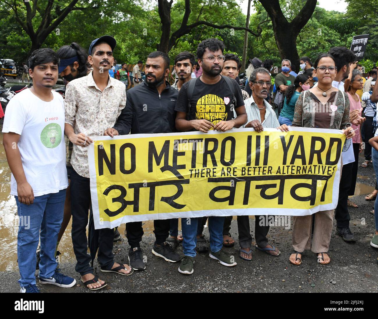 Protesters hold a banner that says 'No Metro 3 yard' during the protest