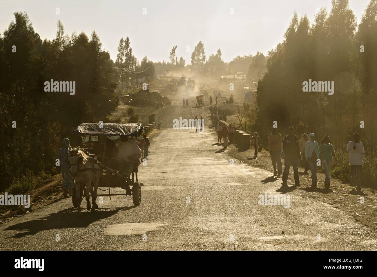 Pedestrians and cart on a road under construction, Amhara Region, Ethiopia Stock Photo