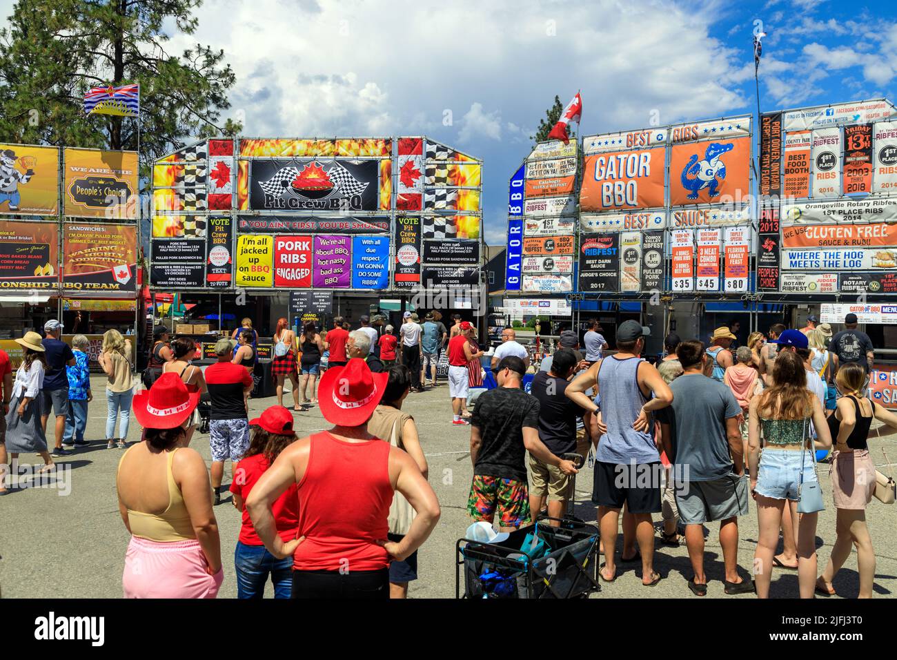 Penticton, British Columbia, Canada - June 30, 2022: Crowds of people at the Penticton Rib Fest where barbecue teams from across Canada compete for be Stock Photo
