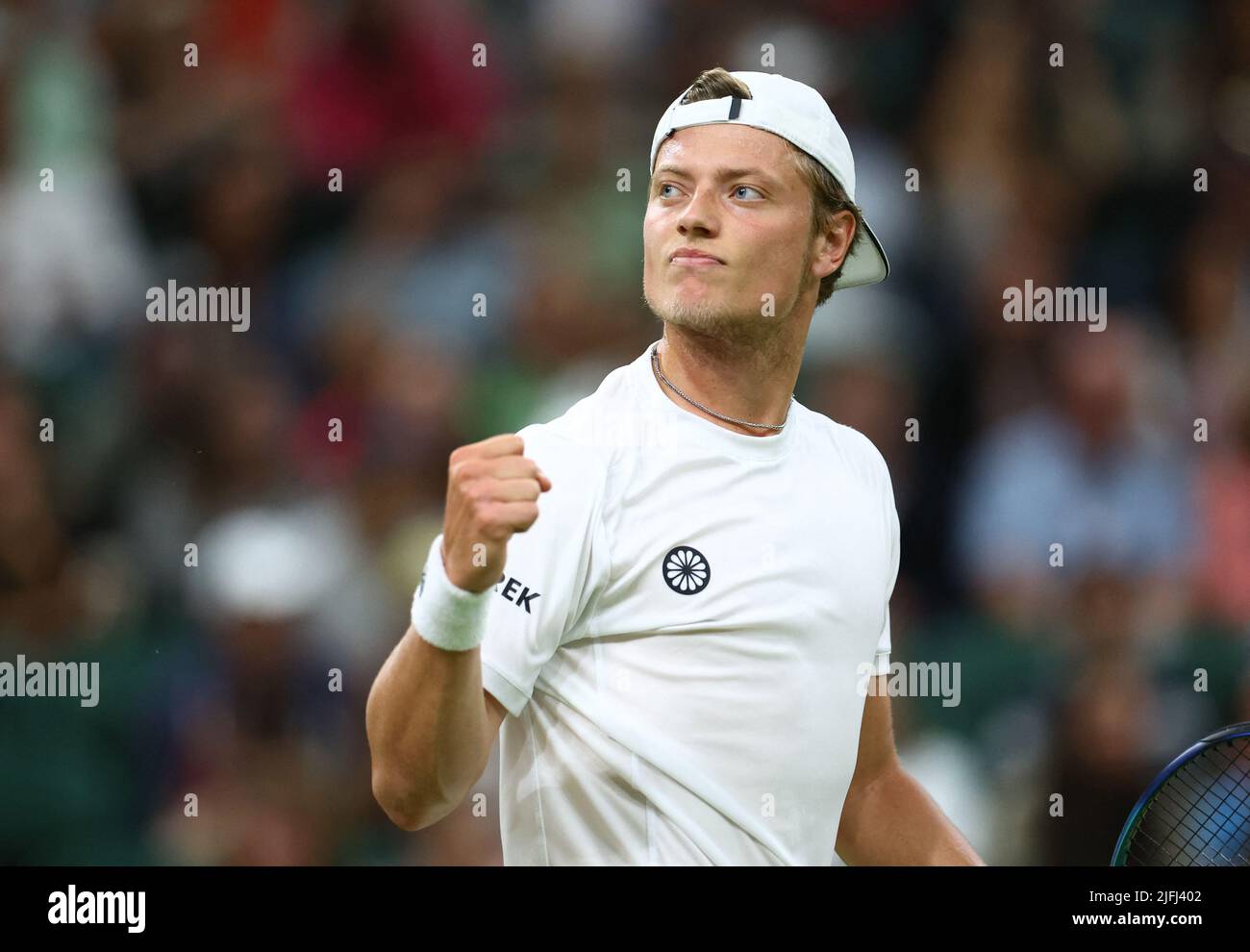 Tennis - Wimbledon - All England Lawn Tennis and Croquet Club, London, Britain - July 3, 2022 Netherlands' Tim van Rijthoven reacts during his fourth round match against Serbia's Novak Djokovic REUTERS/Hannah Mckay Stock Photo