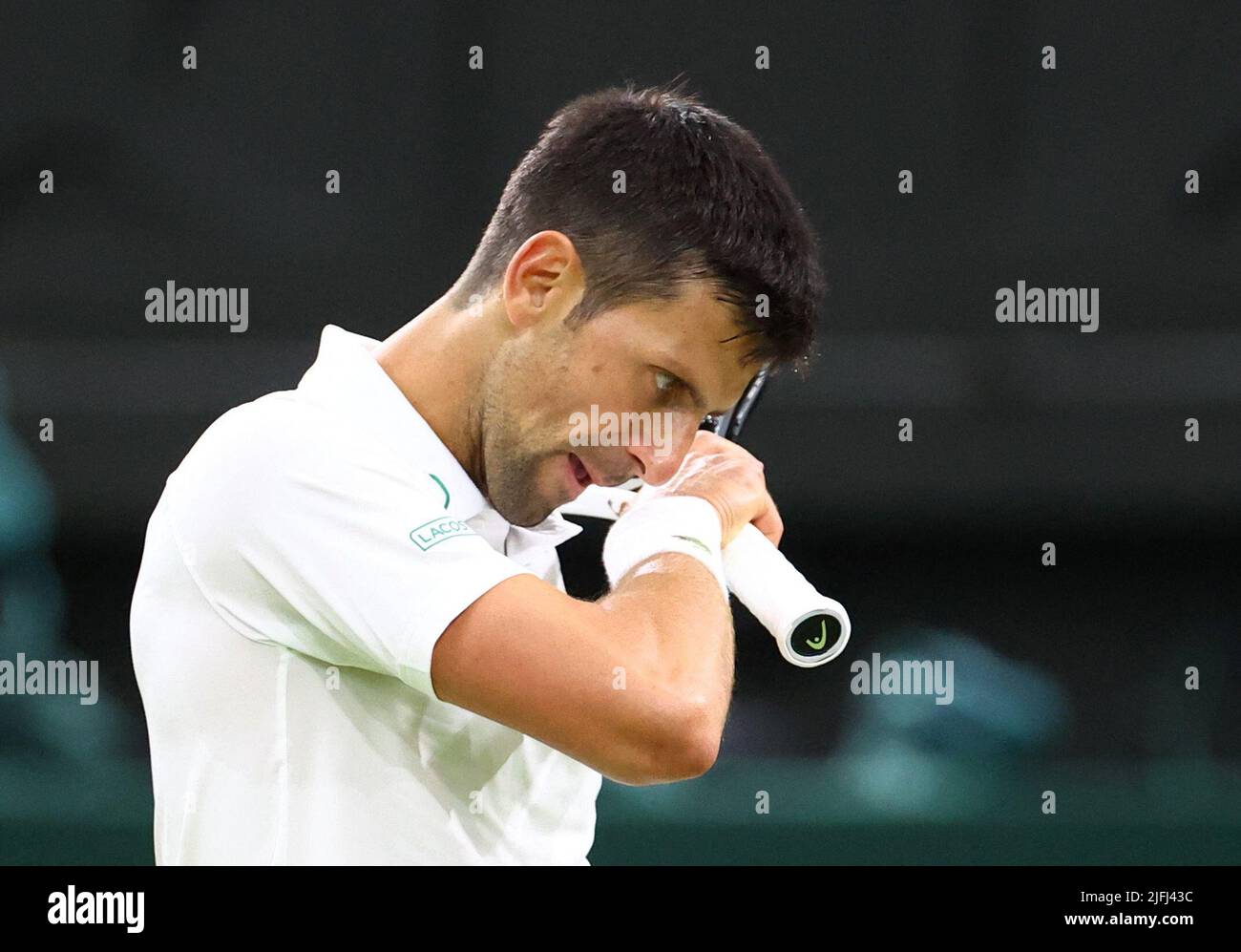 Tennis - Wimbledon - All England Lawn Tennis and Croquet Club, London, Britain - July 3, 2022 Serbia's Novak Djokovic during his fourth round match against Netherlands' Tim van Rijthoven REUTERS/Hannah Mckay Stock Photo