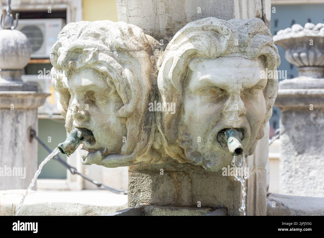 Water spouts on 17th Century Da Ponte Fountain (Da Pontejev vodnjak), Preseren Square, Koper, Slovene Istria, Slovenia Stock Photo