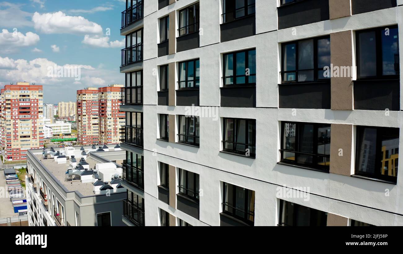 A sunny daytime exterior of a typical upscale apartment building. Stock ...