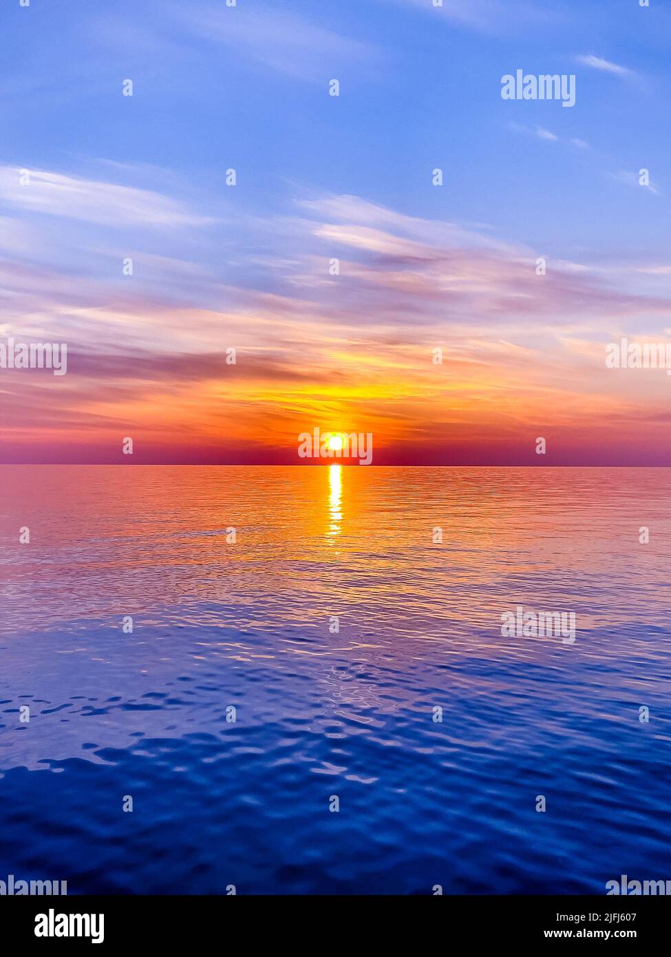 Calm sea with sunset sky In Sochi Stock Photo