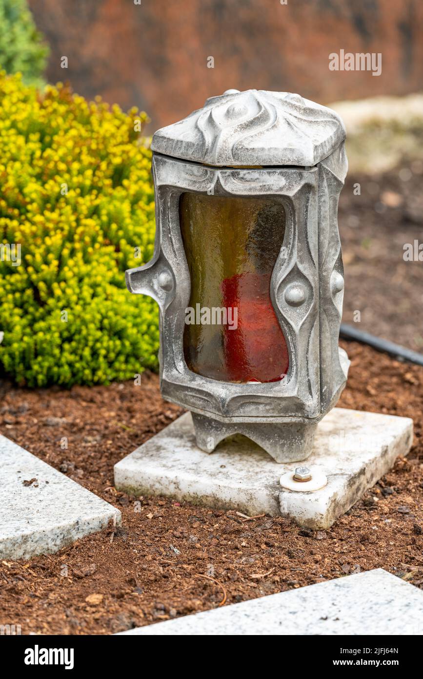 Candles on graves symbolize the memory of the dead on November 1 Stock