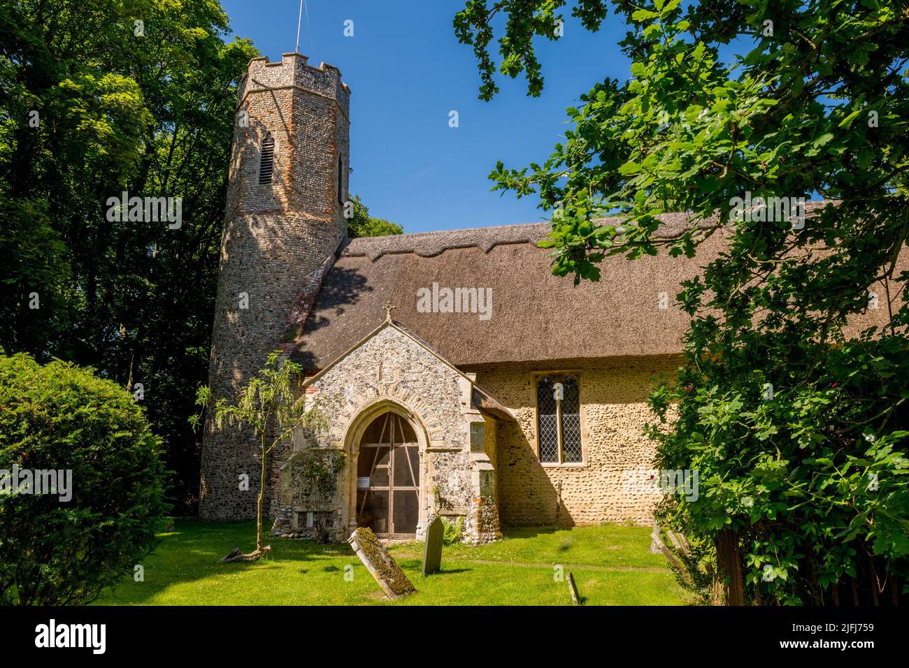 Thatched roof of All Saints church, Horsey, Norfolk, England Stock Photo
