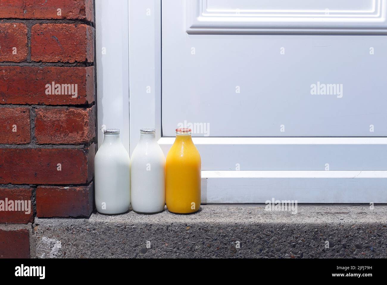 Pints of Milk & a pint of fresh orange juice on a doorstep delivered by