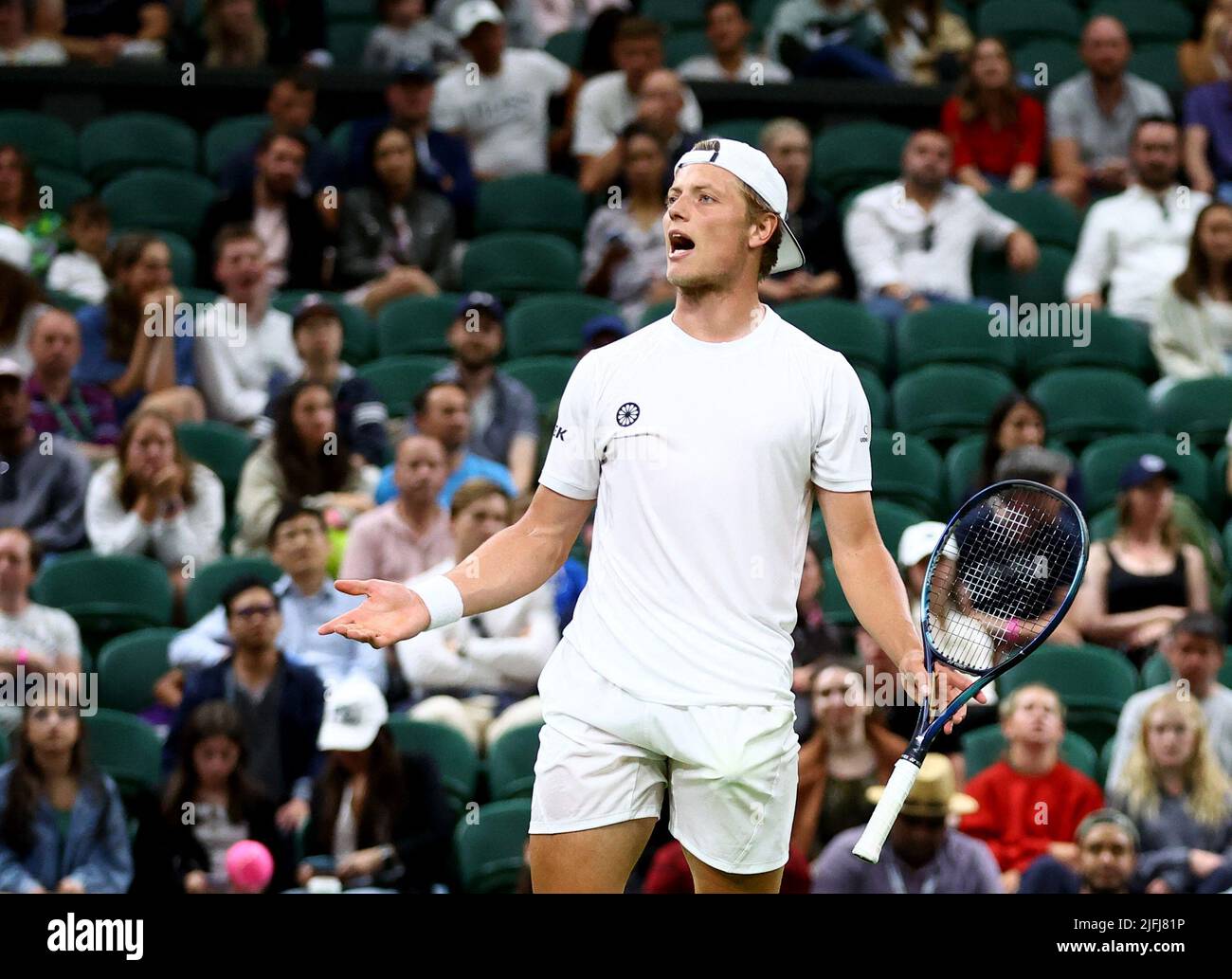 Tennis - Wimbledon - All England Lawn Tennis and Croquet Club, London, Britain - July 3, 2022 Netherlands' Tim van Rijthoven reacts during his fourth round match against Serbia's Novak Djokovic REUTERS/Hannah Mckay Stock Photo