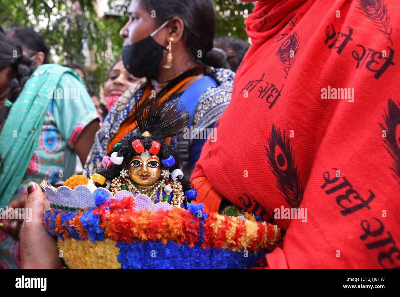 Krishna Rope Mumbai, India. 03rd July, 2022. A devotee seen holding the idol of baby ...