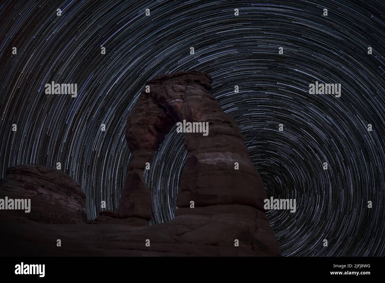 Natural stone arch star trails hi-res stock photography and images - Alamy