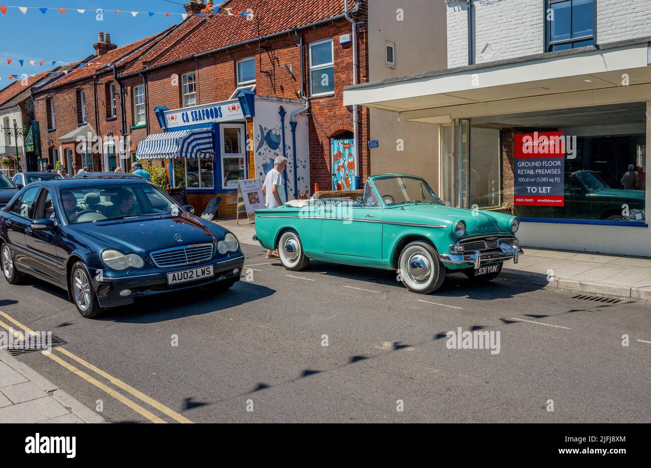 Hillman Minx convertible or soft top in bright green colour, England, UK. Stock Photo