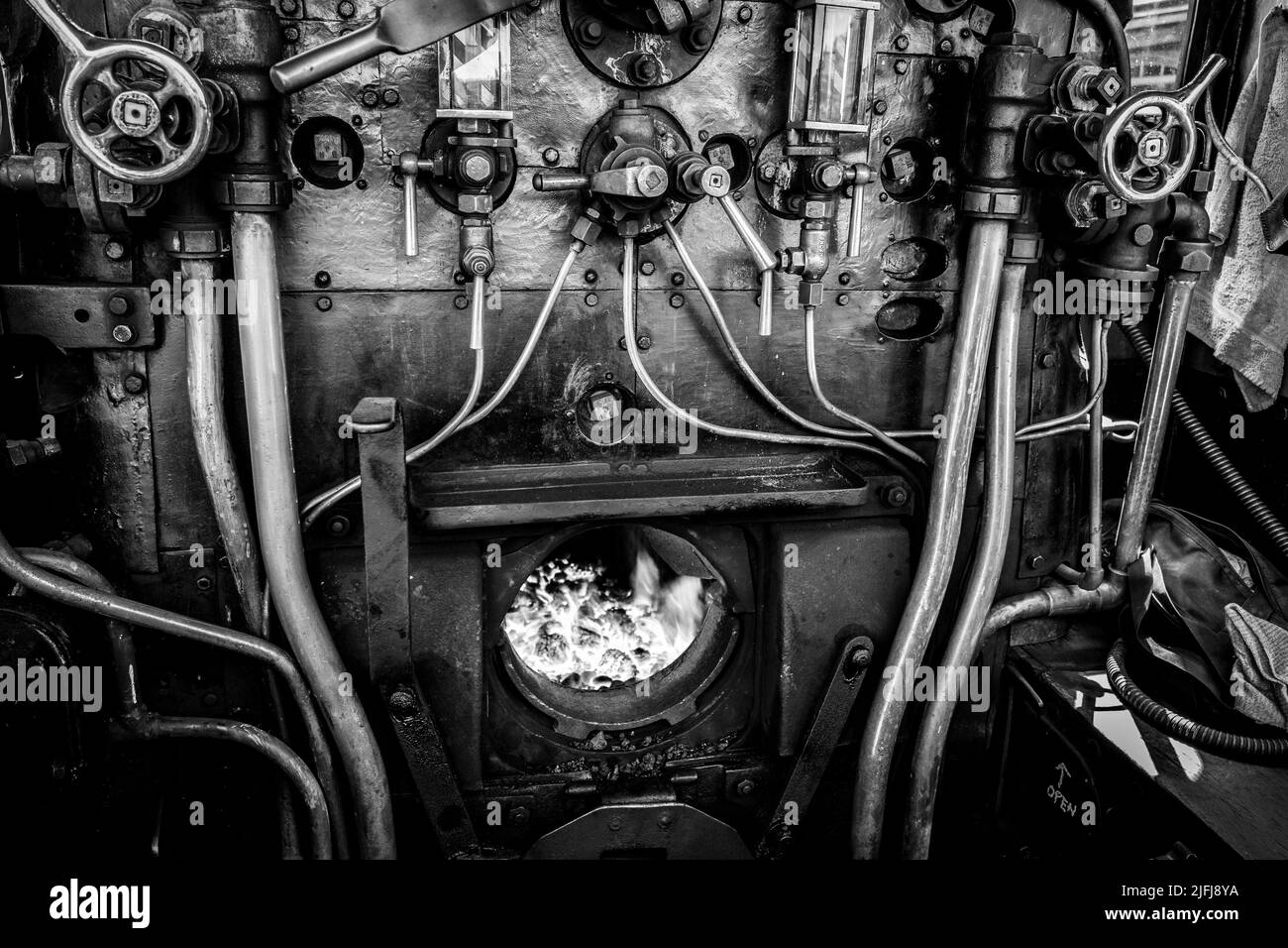 Fire box and main boiler control valves of the Class 7F 2-8-0 No 53809 locomotive steam train at Holt station, Norfolk, England. Stock Photo