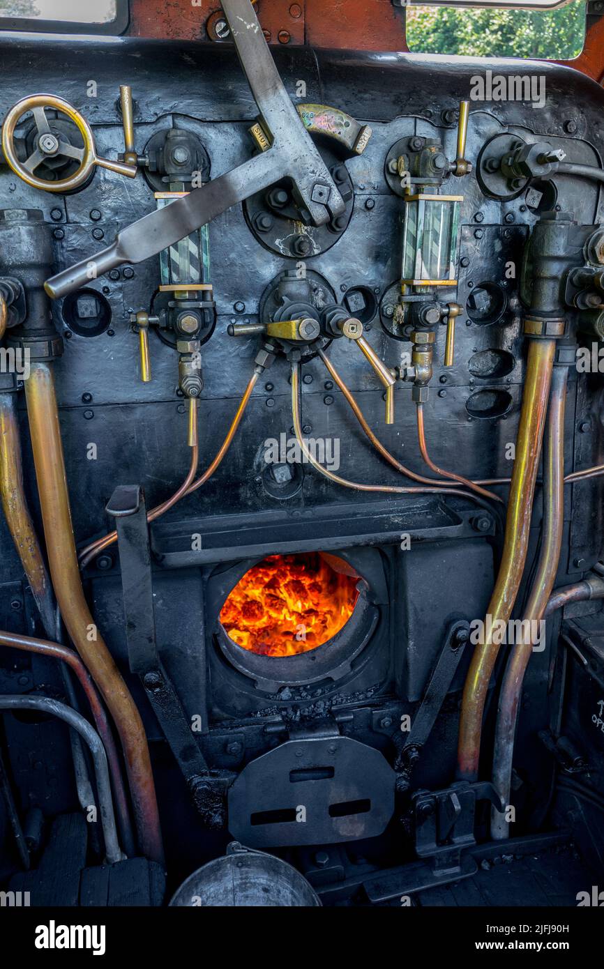 Fire box and main boiler control valves of the Class 7F 2-8-0 No 53809 locomotive steam train at Holt station, Norfolk, England. Stock Photo