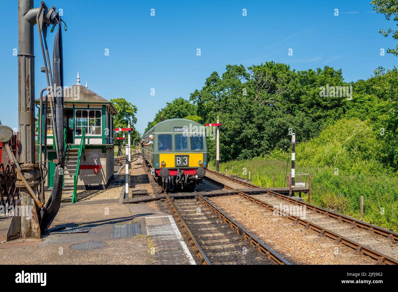The British Rail Class 101 diesel multiple units, DMU, 51188/56352, ‘Heritage Railcar’ run by the North Norfolk Railway pull into Holt Railway station. Stock Photo