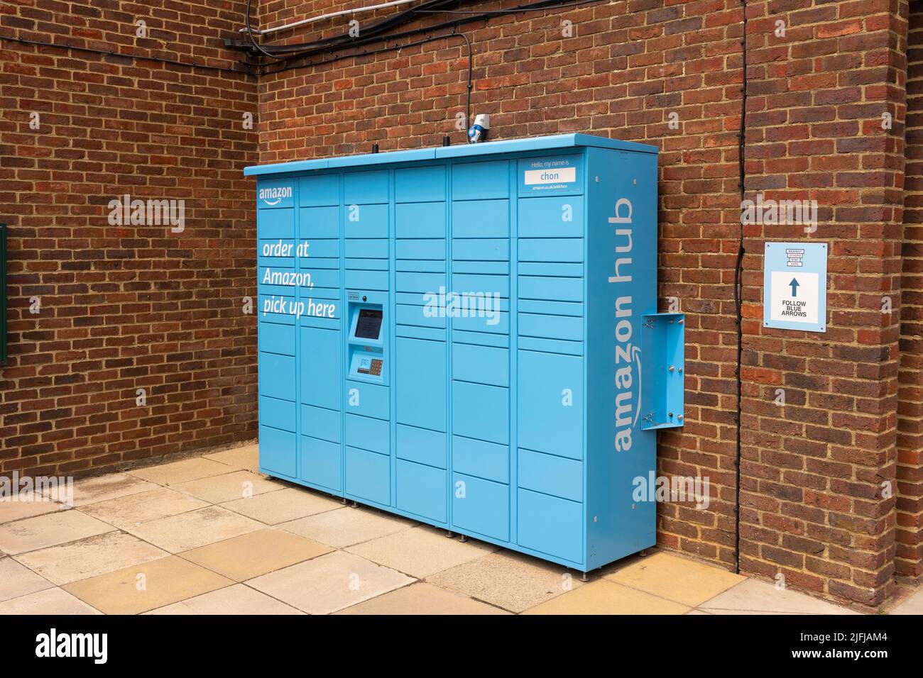 Blue Amazon Hub lockers used for Amazon customers to retrieve secure deliveries at Chineham shopping centre, Basingstoke, England, UK Stock Photo