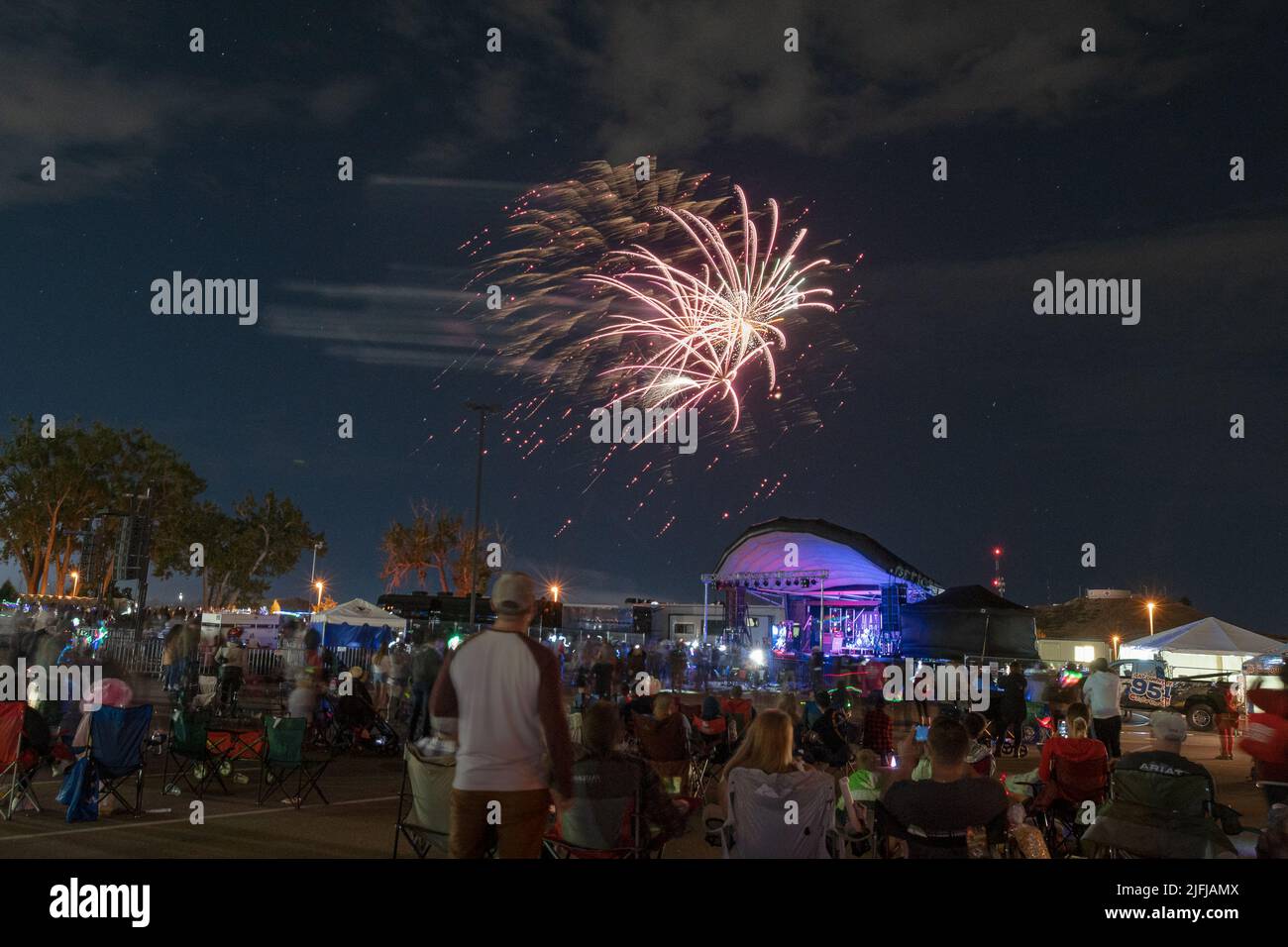 Families, Soldiers and community members watch the fireworks during the
