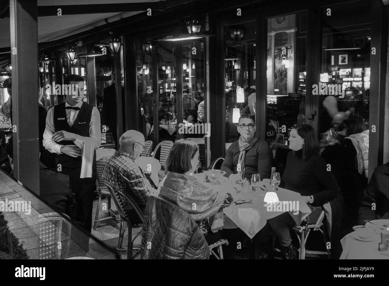 05-14-2016  Paris. People in  cafe on  Champs Elysees  street  in Paris.  good mood in one of the best places in the world Stock Photo