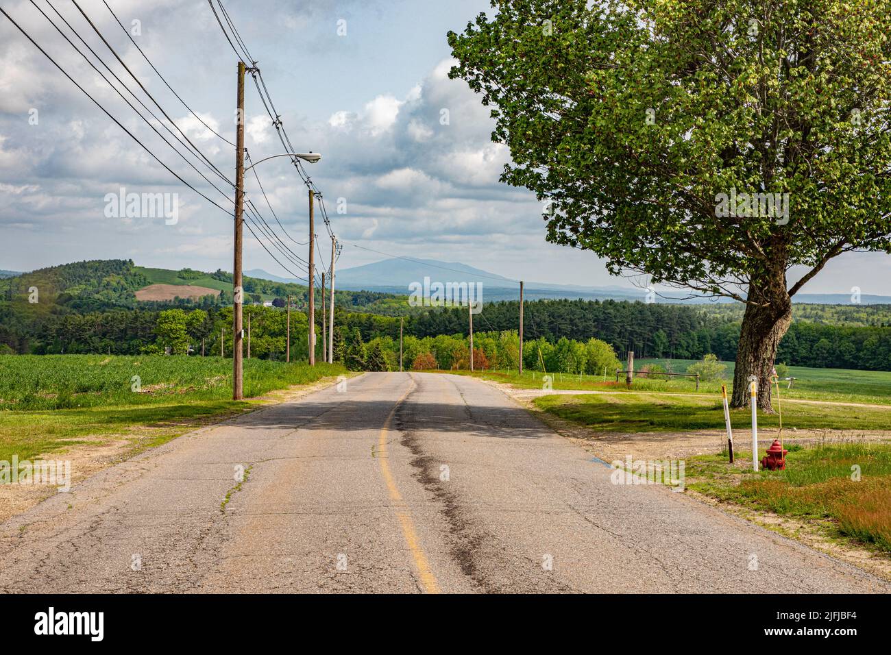 A rural town road  in Templeton, Massachusetts - Mount Monadnock is in the distance Stock Photo