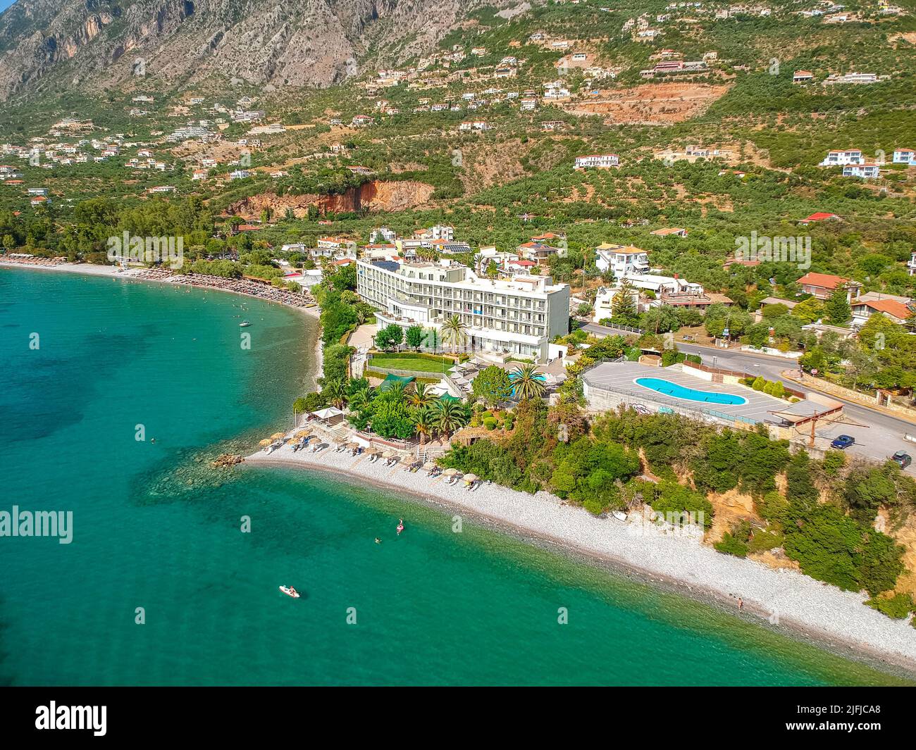 Aerial view over Almyros beach with luxurious hotels and resorts in Kato verga kalamata, Greece. Stock Photo