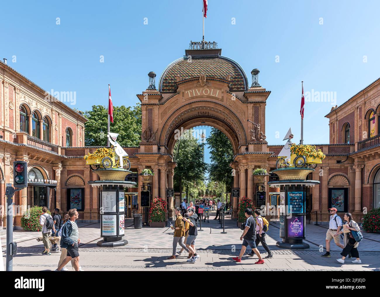 people walking in front of the main gate to the tivoli gardens in Copenhagen, July 2, 2022 Stock Photo