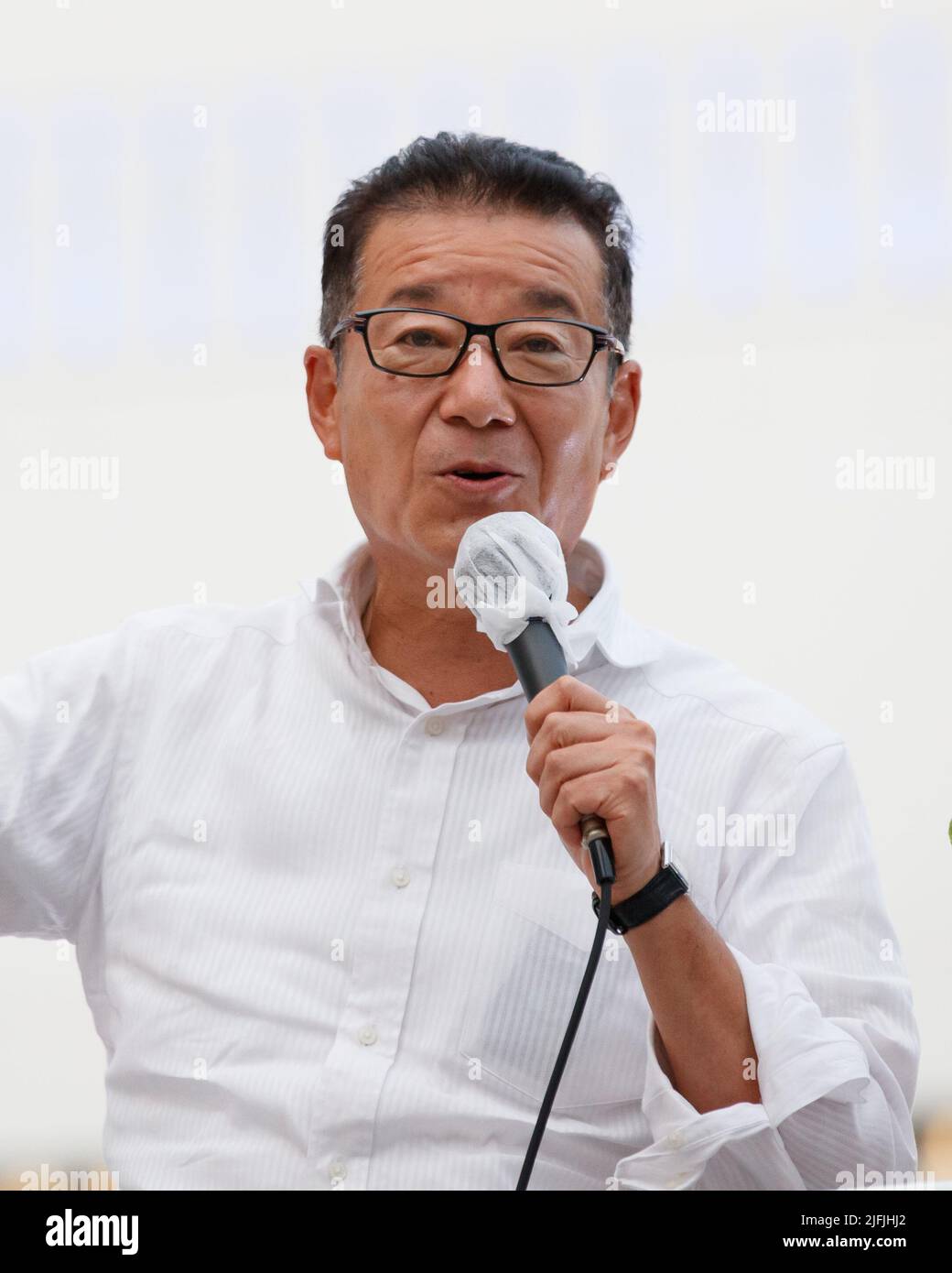 Leader of Japan Innovation Party, Ichiro Matsui appeals to voters to speak in support of the his party's candidates Naoki Inose and Yuki Ebisawa during an Upper House electio campaign in Tokyo, Japan on July, 02, 2022. (Photo Motoo Naka/AFLO) Stock Photo