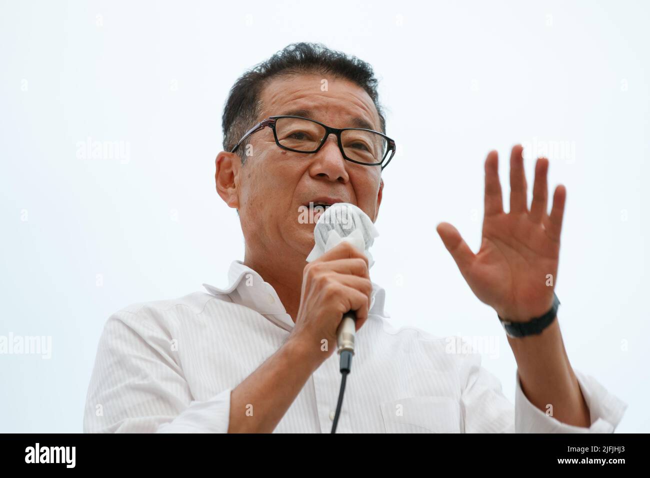 Leader of Japan Innovation Party, Ichiro Matsui appeals to voters to speak in support of the his party's candidates Naoki Inose and Yuki Ebisawa during an Upper House electio campaign in Tokyo, Japan on July, 02, 2022. (Photo Motoo Naka/AFLO) Stock Photo