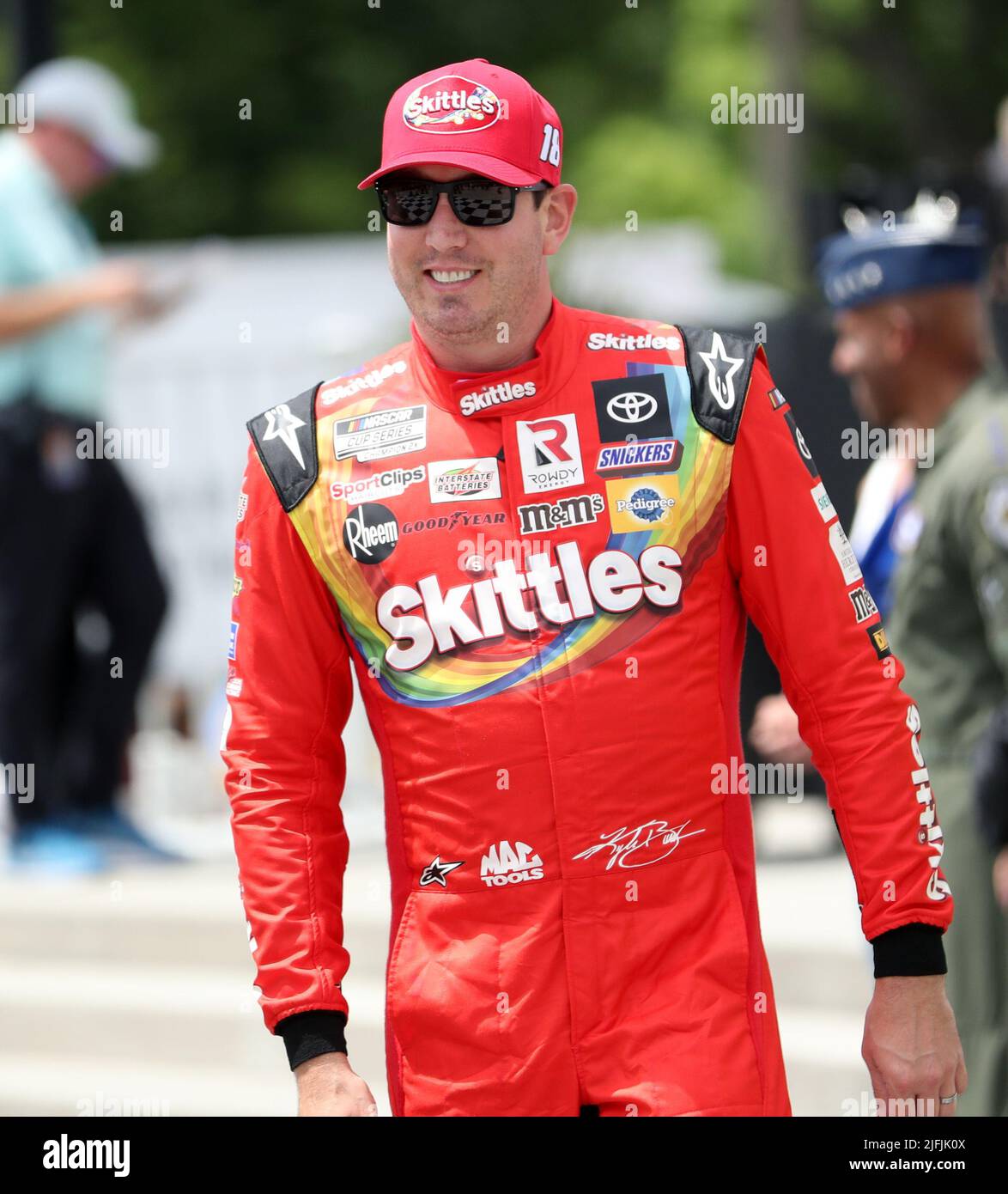 Plymouth, Wisconsin, USA. 3rd July, 2022. Kyle Busch, driver of the #18 Skittles America Mix Toyota, smiles after being introuced before the NASCAR Cup Series Kwik Trip 250 at Road America on July 03, 2022 in Plymouth, Wisconsin. Ricky Bassman/Cal Sport Media/Alamy Live News Stock Photo